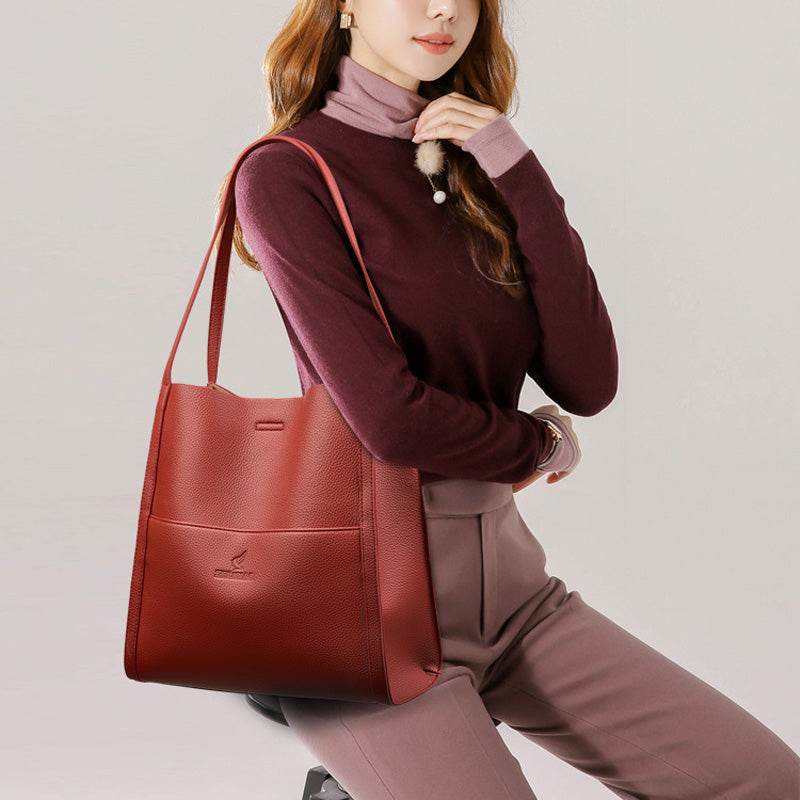 Högkvalitativ axelremsväska i en enfärgad färg