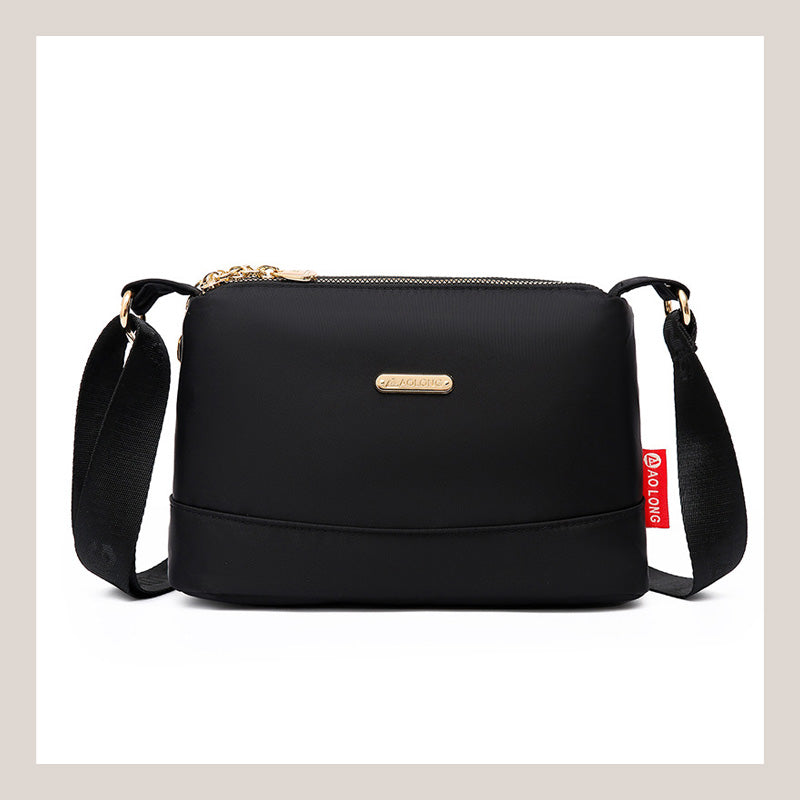 Crossbody-väska med flera fickor för kvinnor