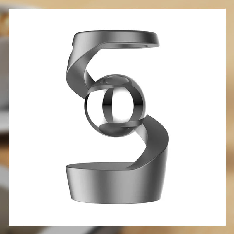 Kinetisk skrivbordsleksak som trotsar gravitationen