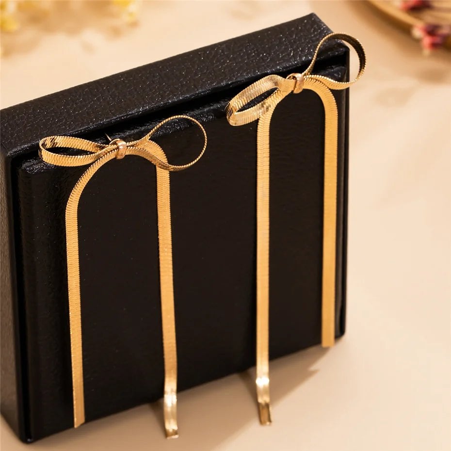 Snygga Bow Tassel Örhängen