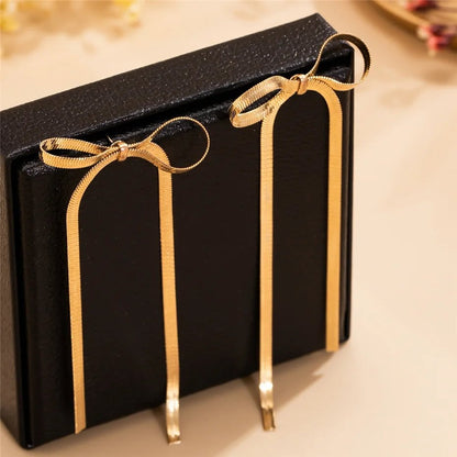 Snygga Bow Tassel Örhängen