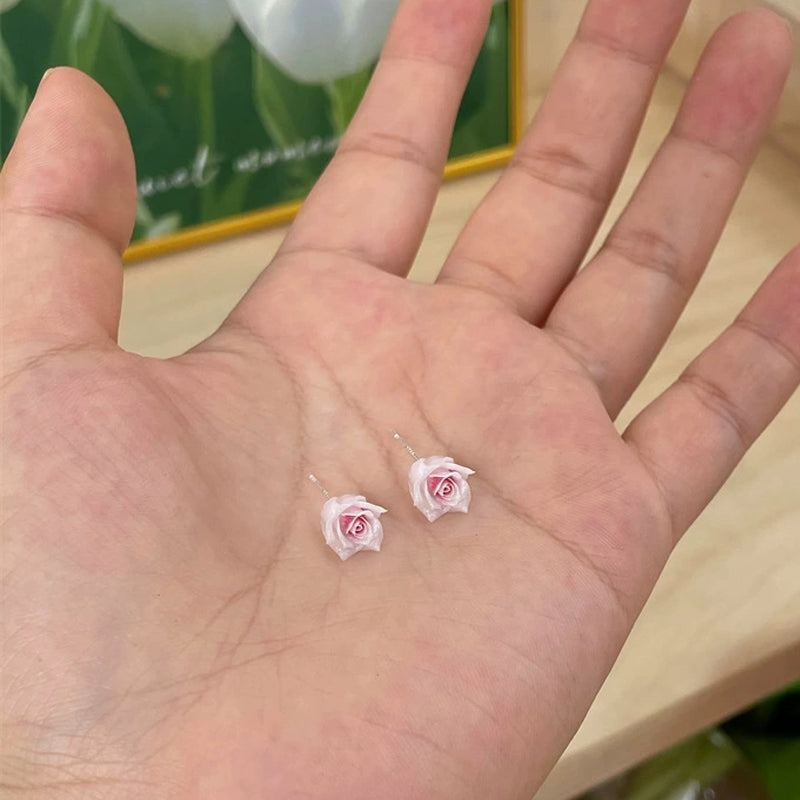 Örhängen med torkad blomma