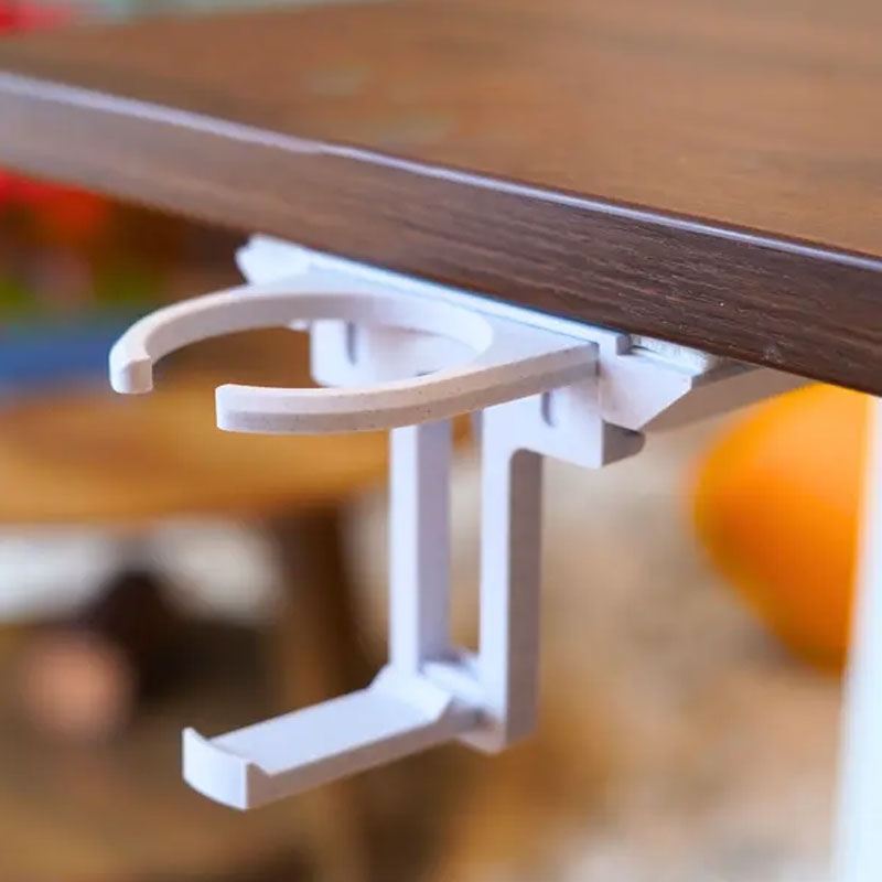 Vikbar mugghållare för skrivbordet