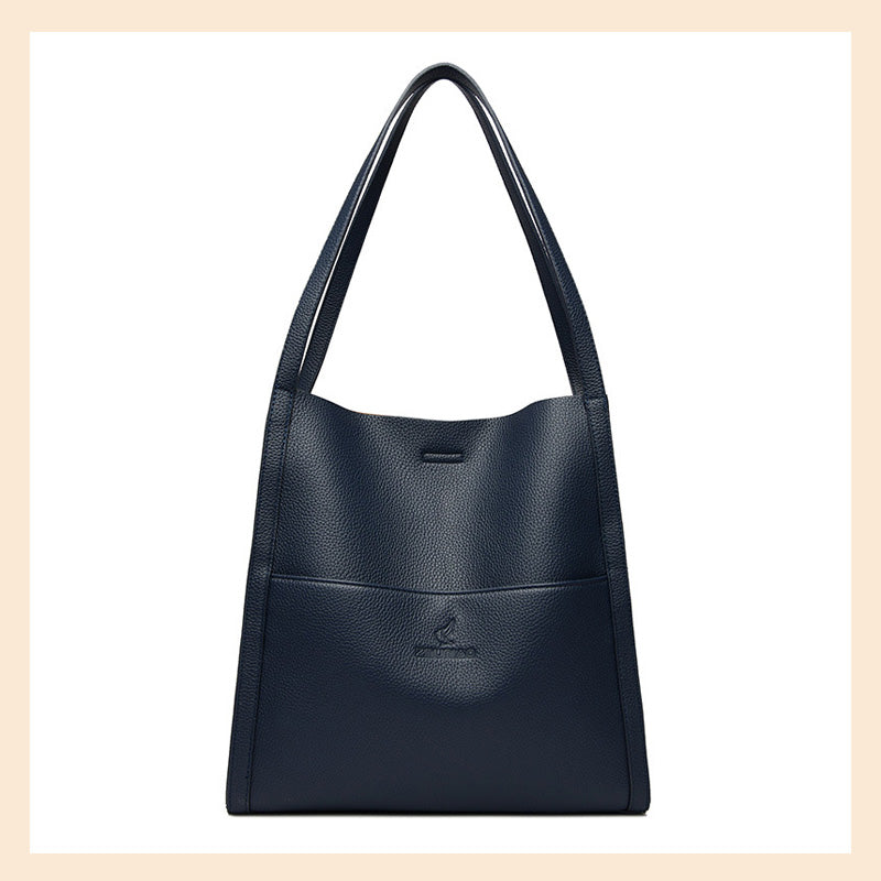 Högkvalitativ axelremsväska i en enfärgad färg