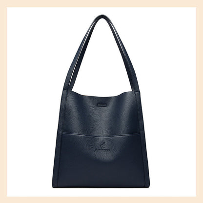 Högkvalitativ axelremsväska i en enfärgad färg