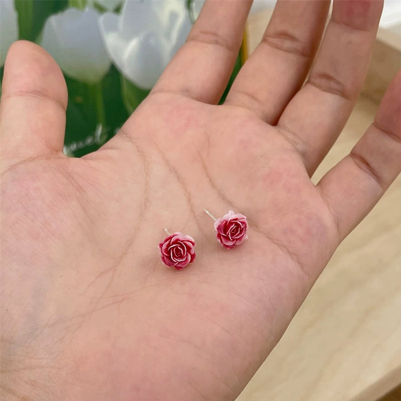 Örhängen med torkad blomma