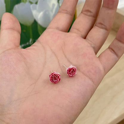 Örhängen med torkad blomma