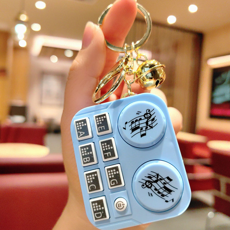 DJ-nyckelring med minidjur Barnleksak