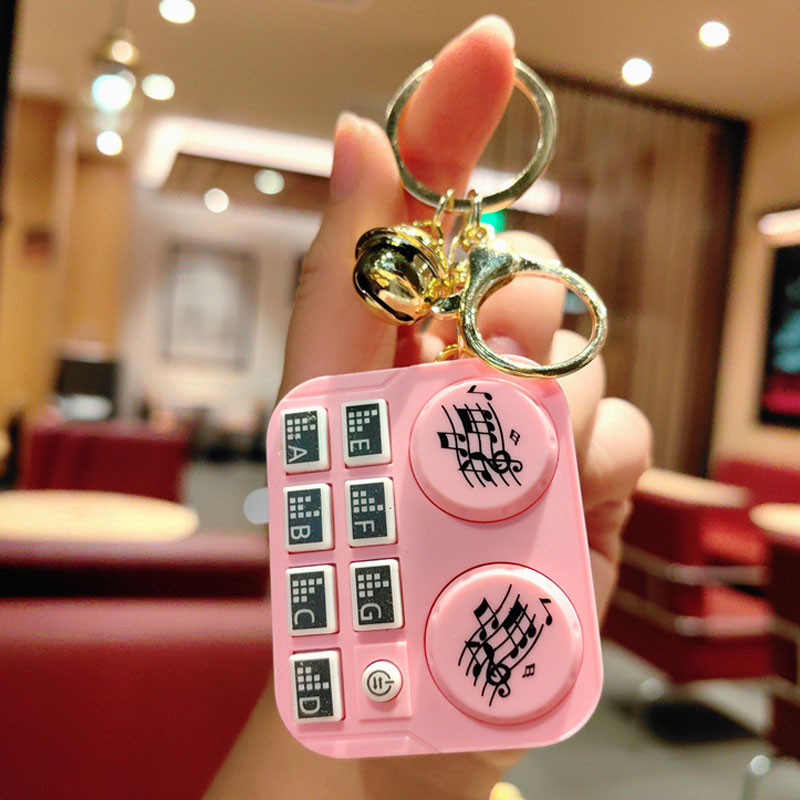 DJ-nyckelring med minidjur Barnleksak