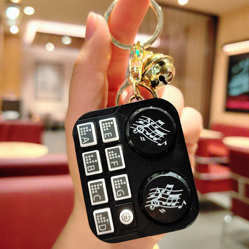 DJ-nyckelring med minidjur Barnleksak