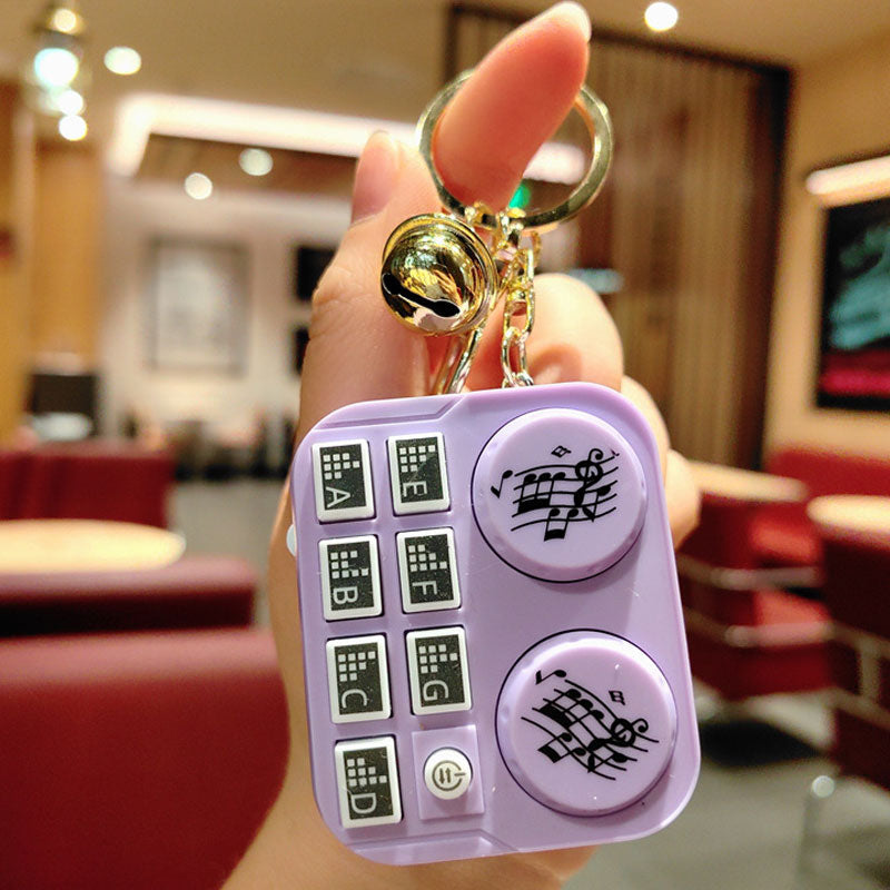 DJ-nyckelring med minidjur Barnleksak