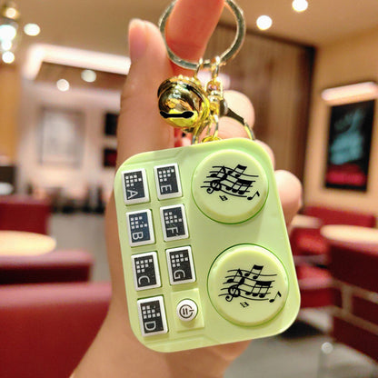 DJ-nyckelring med minidjur Barnleksak