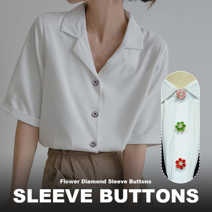 Blommiga diamantknappar på ärmarna