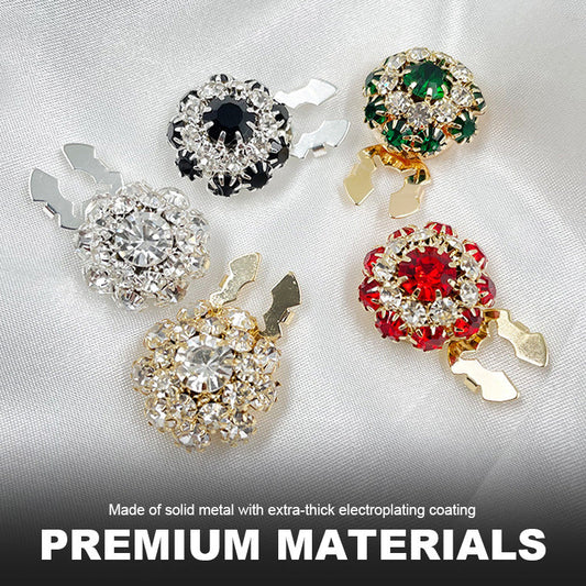 Blommiga diamantknappar på ärmarna