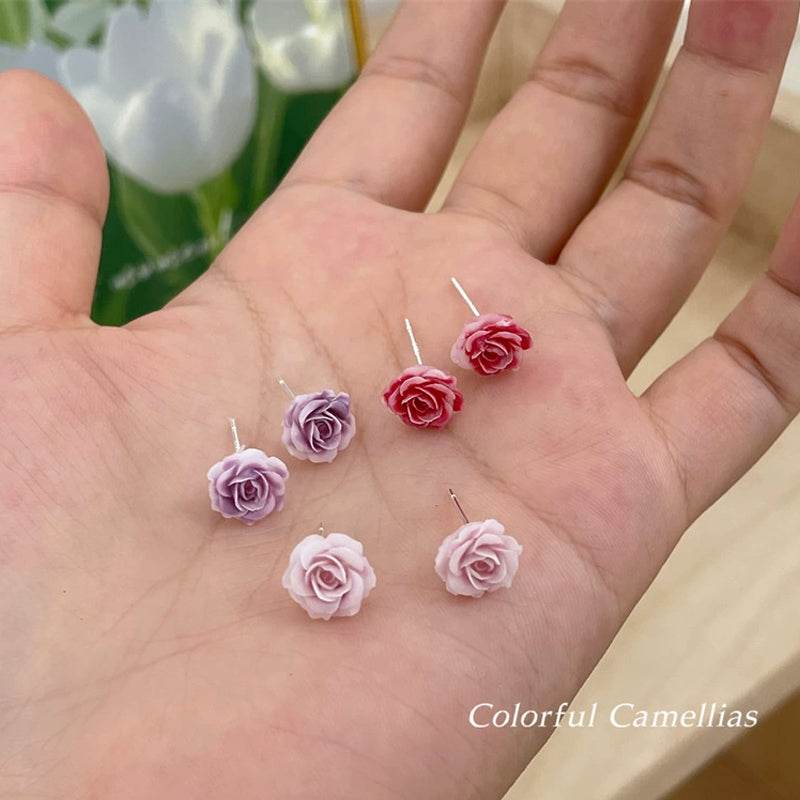 Örhängen med torkad blomma