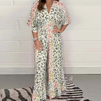 Sommarmönstrad V-ringad jumpsuit med vida ben