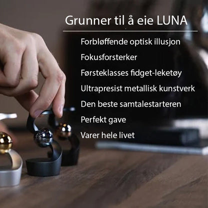 Kinetisk skrivbordsleksak som trotsar gravitationen