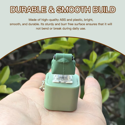 En rolig nyckelring med ljudknappar och lampor som lindrar stress.