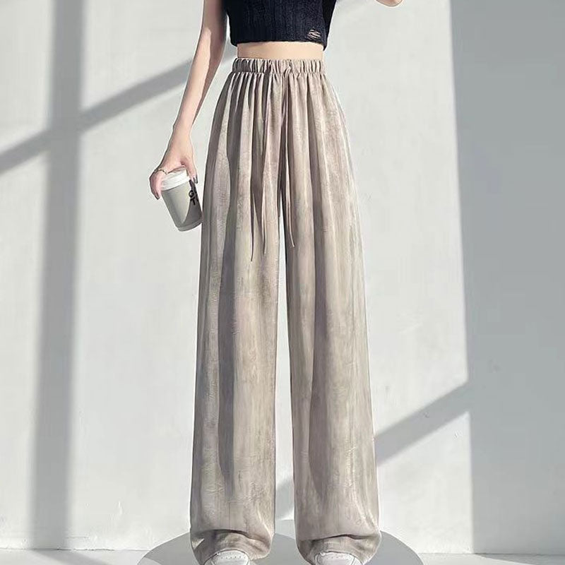 Byxor i batikfärgad issilke med vida ben🍃