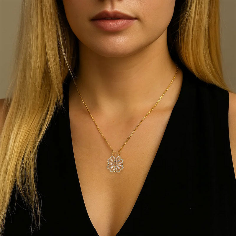 Ett hjärt-till-hjärta dubbelt slitage öppet stängt fyrklöverhalsband