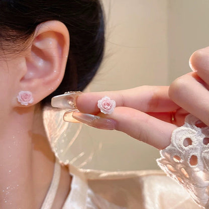 Örhängen med torkad blomma