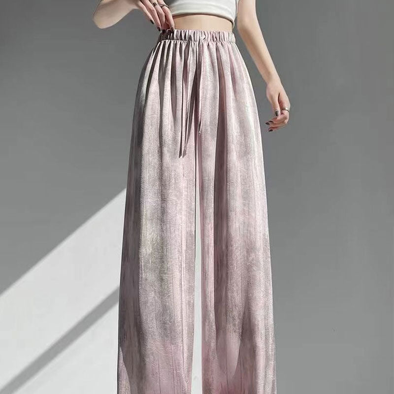 Byxor i batikfärgad issilke med vida ben🍃