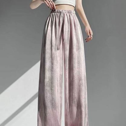 Byxor i batikfärgad issilke med vida ben🍃