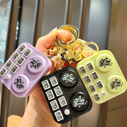 DJ-nyckelring med minidjur Barnleksak