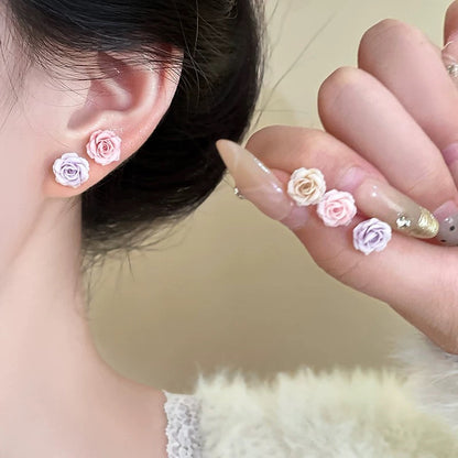 Örhängen med torkad blomma