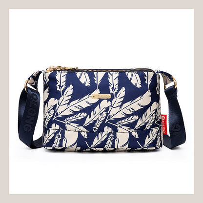 Crossbody-väska med flera fickor för kvinnor