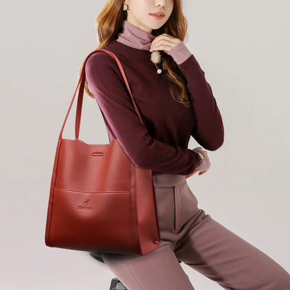 Högkvalitativ axelremsväska i en enfärgad färg