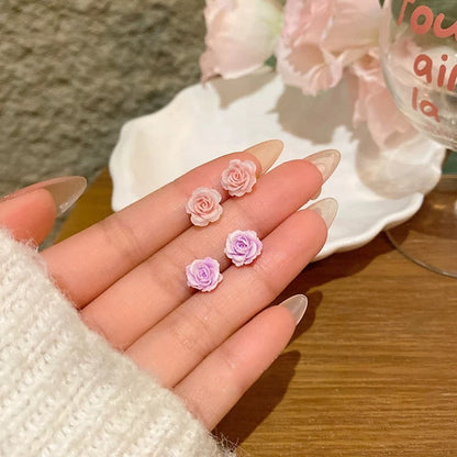 Örhängen med torkad blomma