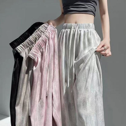 Byxor i batikfärgad issilke med vida ben🍃