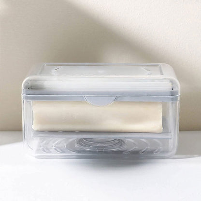 Tvålkopp med avrinningshål och fjäder