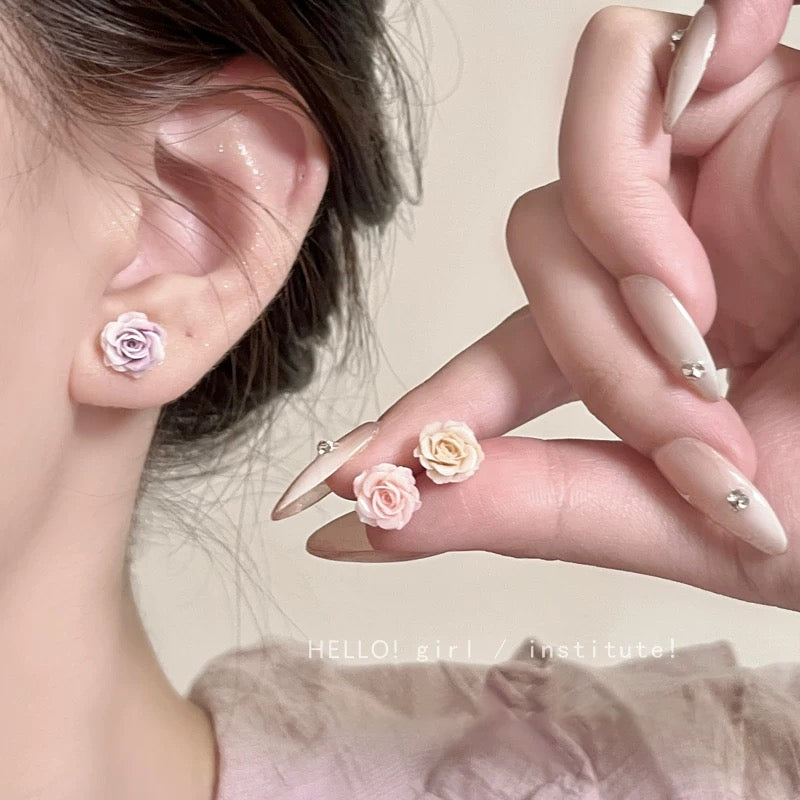 Örhängen med torkad blomma