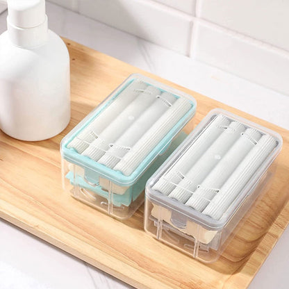 Tvålkopp med avrinningshål och fjäder