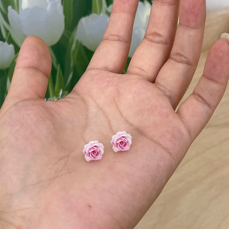 Örhängen med torkad blomma