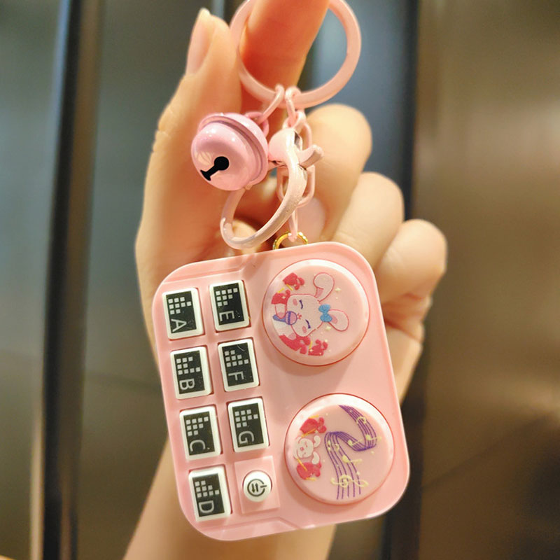 DJ-nyckelring med minidjur Barnleksak