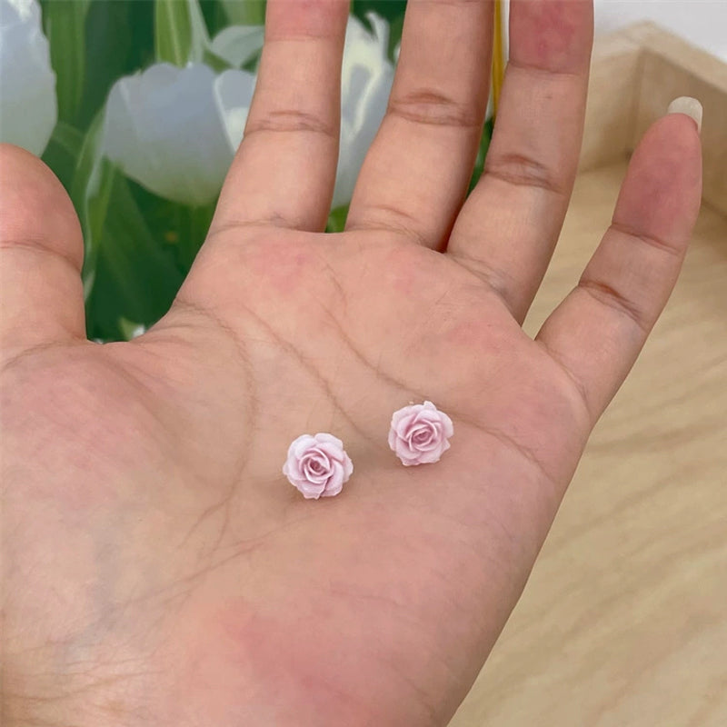 Örhängen med torkad blomma