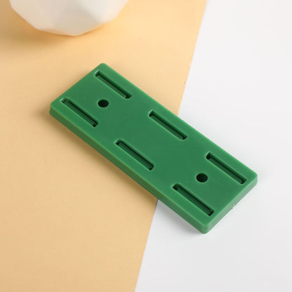 Självhäftande stansfri sockelhållare