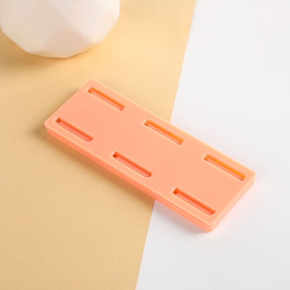 Självhäftande stansfri sockelhållare