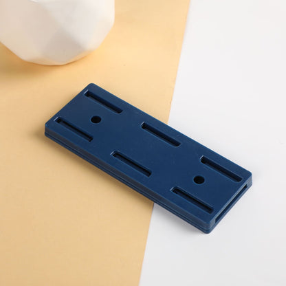 Självhäftande stansfri sockelhållare