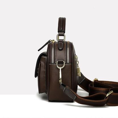 Elegant skulderveske med dobbelt lag og bred stropp